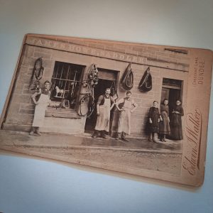 J&J Howe craftsmen and shop assistants outside saddlery workshop